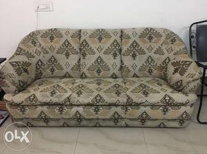 Brown And White Floral Fabric Sofa