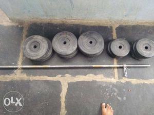Four Black Metal Weight Plates
