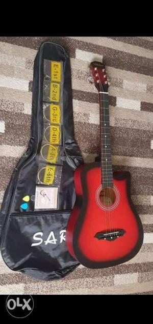 Red And Black Venetian-cutaway Acoustic Guitar With Gig Bag