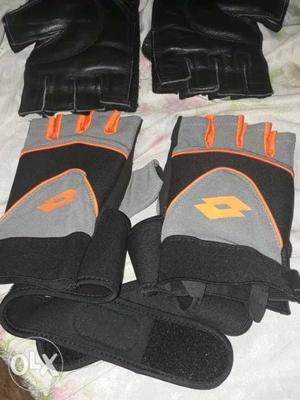 Two Pair Of Ghray And Black Gloves