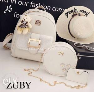 Women's Three White Leather Bags With Text Overlay