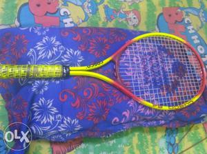 Yellow And Red Tennis Racket