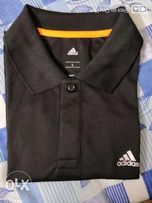 Adidas Climalite polo t shirt. Size M-L Material