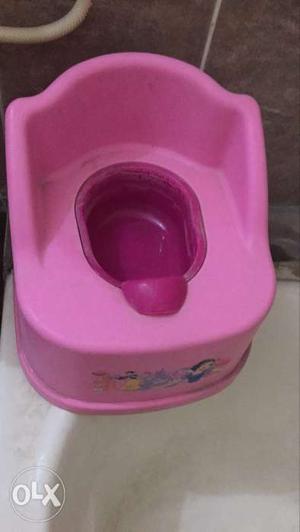 Baby's Pink And White Potty Trainer