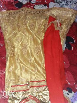 Brand new lehga in red and golden combination.