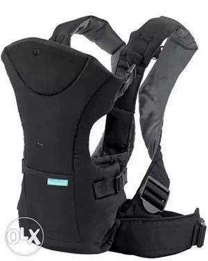 Branded Baby Carrier. Both front and rear facing