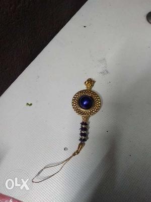 Gold And Purple Gemstone Pendant Necklace
