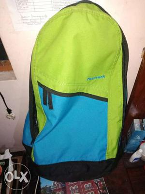 Green, Blue, And Black Backpack