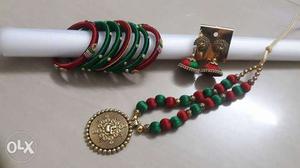 Green, Red, And Gold-colored Thread Bangles And Necklace