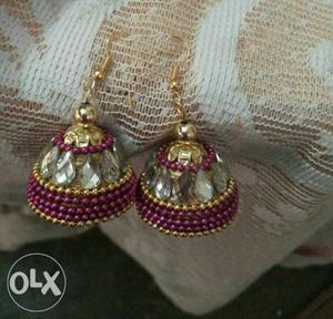 Pair Of Beaded Purple Jhumkas Earrings