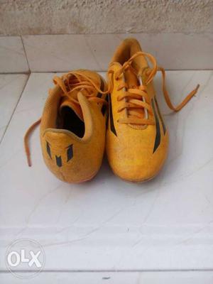 Pair Of Orange adidas football Shoes