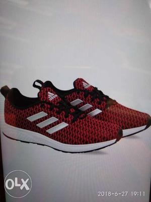 Pair Of Red Adidas Running Shoes