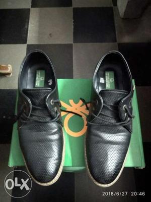 Pair Of UCB Black Shoes