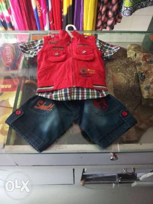 Red Zip-up Vest And Faded Blue Denim Shorts