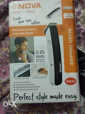 This is new beard trimmer with silver alloy steel