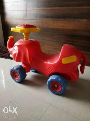 Toddler's Red And Blue Plastic Ride-on Toy