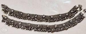 Two Silver-colored Chain Bracelets