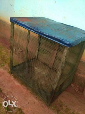 Brown And Blue Wooden Cage