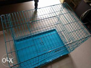 Dog cage. 2.5 feet to 3 feet in height. Foldable.