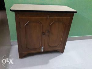 Small bar cabinet made of teak ply Useable