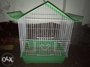White And Green Metal Birdhouse
