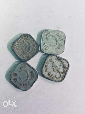 Four 5 Silver-colored Indian Paise Coins