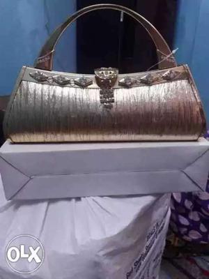 Golden purse h dabba pack
