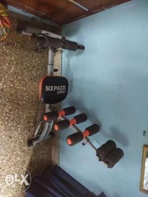 Gray And Black Six Pack Exercise Machine