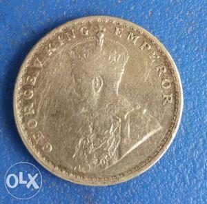 It's an old silver coin of British from the year