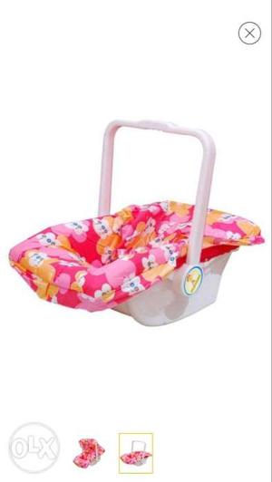 Less used 9 in 1 carry cot along with hanging