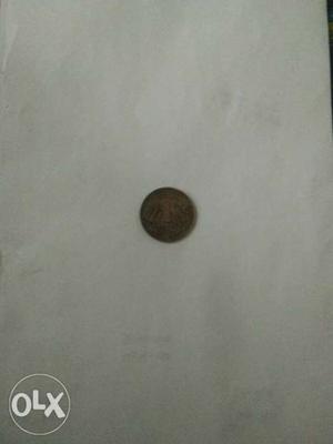 Old one rupee coin on