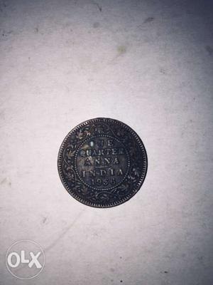 Round Silver-colored 1 Quarter Anna India Coin