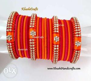 Three Orange-and-red Bangle Bracelets With Text Overlay
