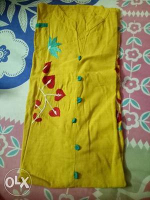 Yellow colour Kurti. in good condition. colourful