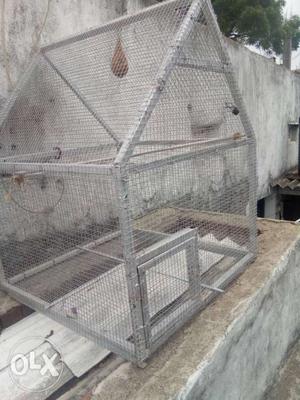 Gray Framed Chain-link Fence Birdhouse