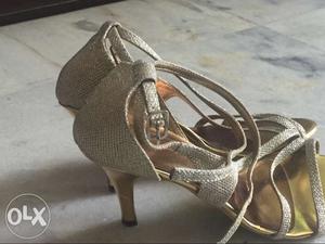 Golden coloured heels, wore it twice, availble