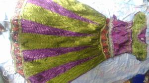 Green, Purple, And Yellow Textile