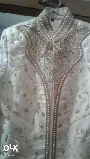 Heavy embroidered sherwani.one time use
