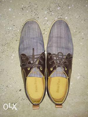 Pair Of Brown-and-white Boat Shoes