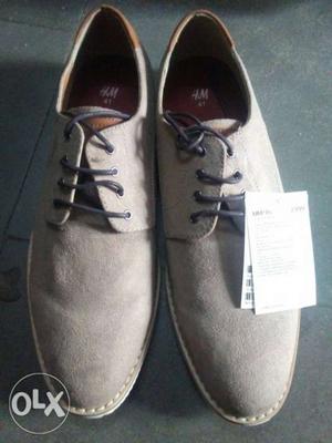 Pair Of Gray Suede Dress Shoes