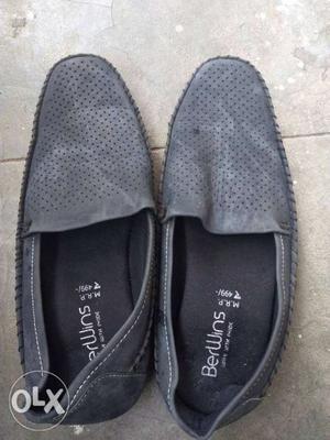 Pair Of Gray Toms Slip-on Shoes.