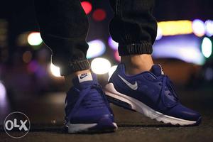 Pair Of Royal-blue-and-white Nike Sneakers