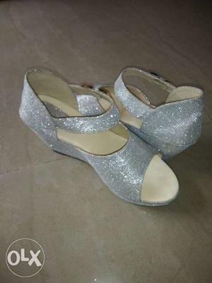 Pair Of Women's Silver Open-toe Wedges