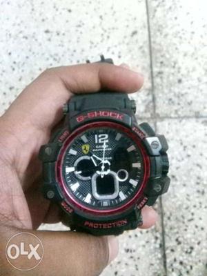Round Black And Red Casio G-Shock Digital Watch