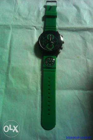 Round Black Chronograph Watch With Green Strap