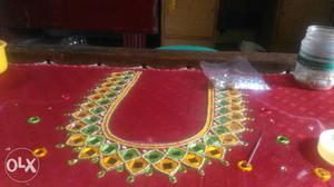 Yellow And Red Textile With Embroidery