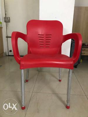 An almost new red arm chair