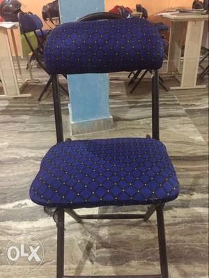 Blue And Black Padded Chair