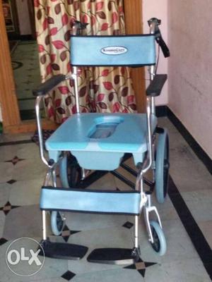 Blue And Silver Wheelchair With Potty