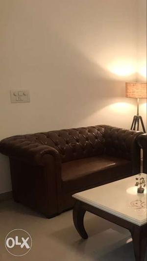 Brown leather 2 Seater sofa